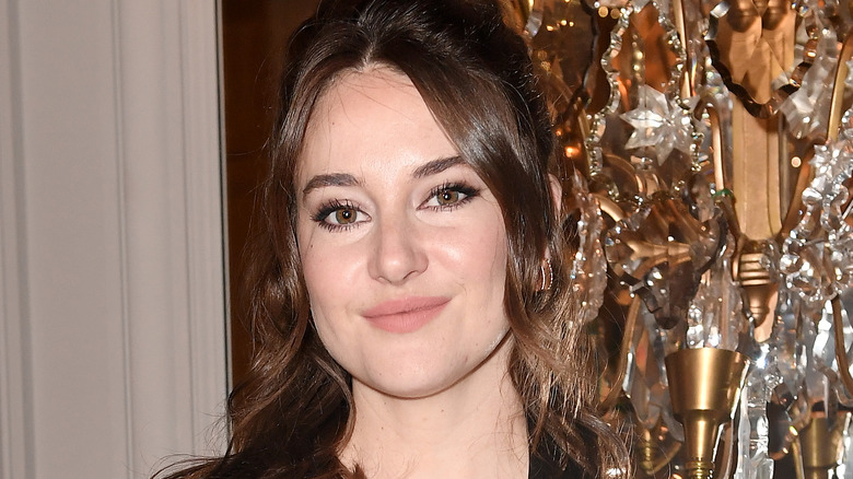 Shailene Woodley at an event, smiling