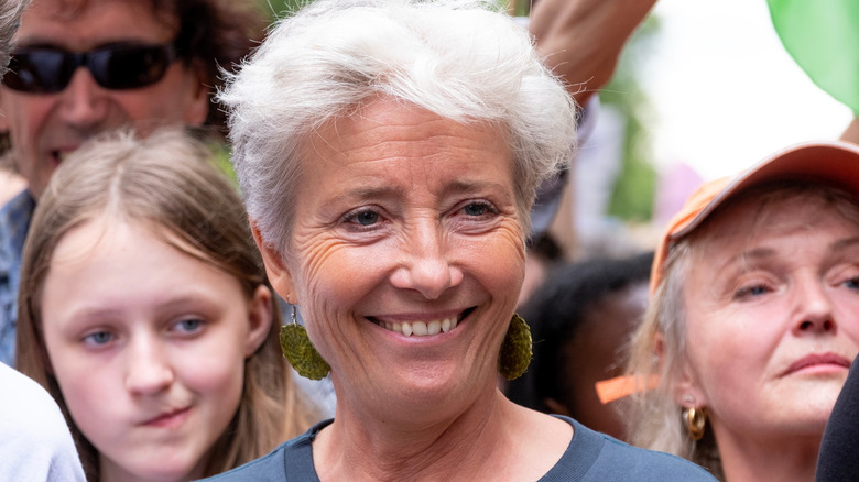 Emma Thompson smiling at a running event in 2024