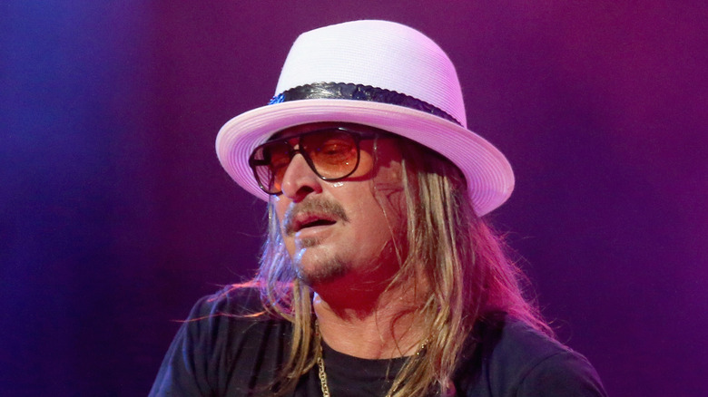 Kid Rock in a white hat 