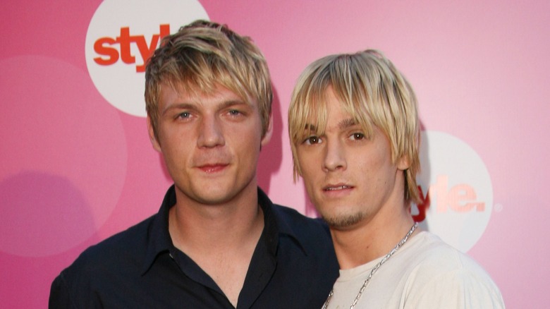 Nick Carter, Aaron Carter, both posing