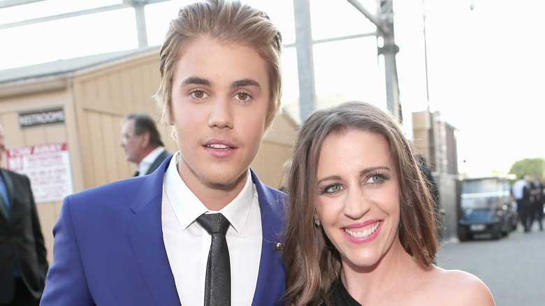 Justin Bieber, Pattie Mallette, both smiling