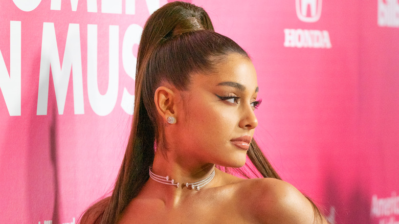 Ariana Grande against pink background
