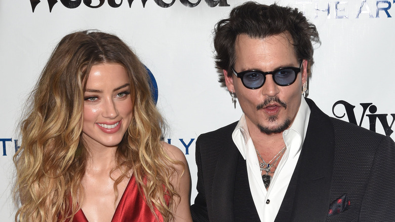 Amber Heard and Johnny Depp smiling