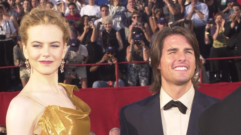 Tom Cruise and Nicole Kidman squinting