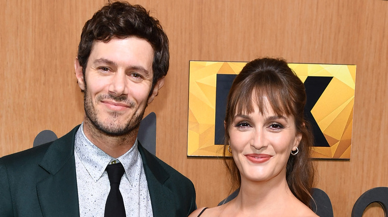 Adam Brody and Leighton Meester at an event