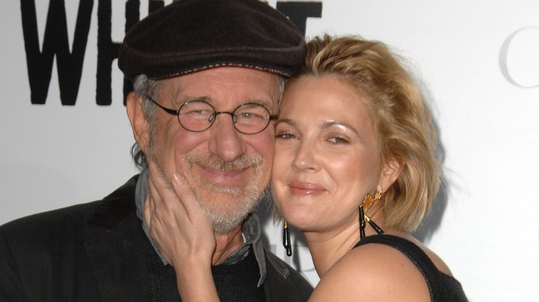 Drew Barrymore and Steven Spielberg cheek-to-cheek