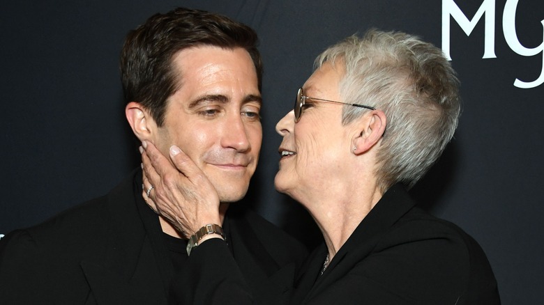 Jamie Lee Curtis touching Jake Gyllenhaal's face