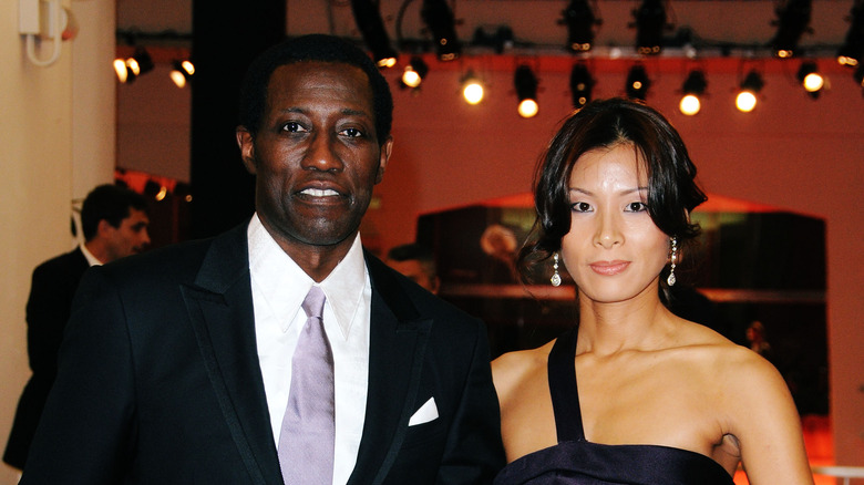 Nikki Park and Wesley Snipes posing