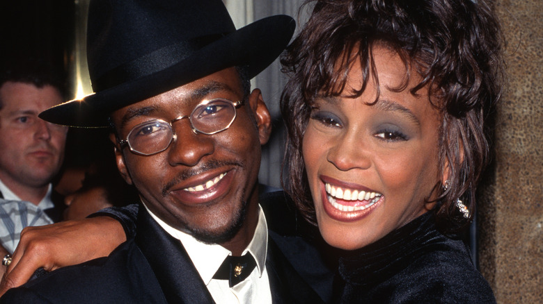 Whitney Houston and Bobby Brown smiling