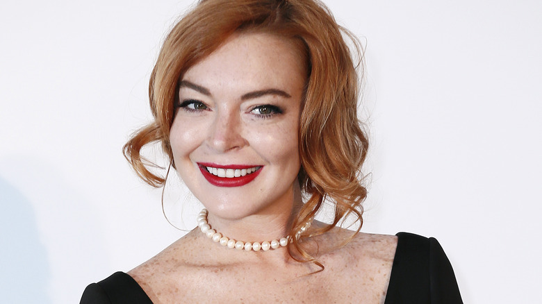 Lindsay Lohan red lipstick smiling