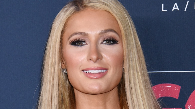 Paris Hilton smiling pink lips