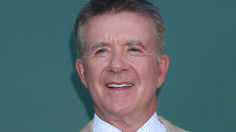 Alan Thicke smiling squinting