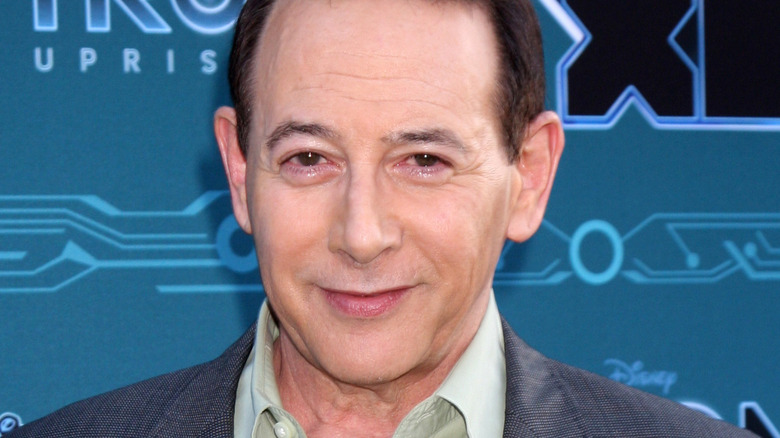 Paul Reubens smirking