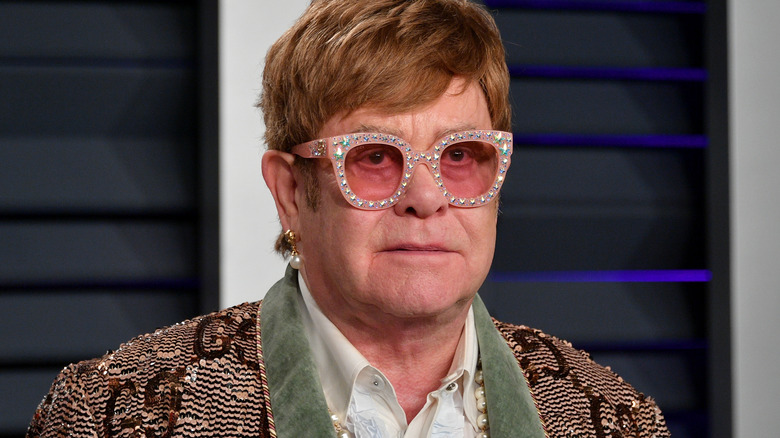 Elton John posing 