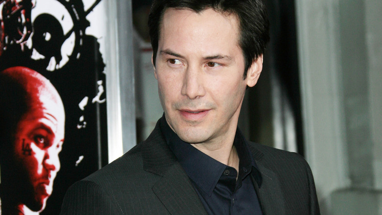 Keanu Reeves posing 