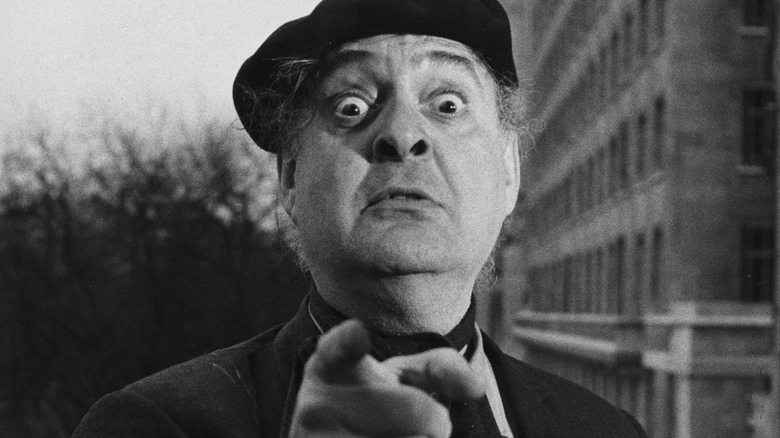 Zero Mostel pointing finger at camera 