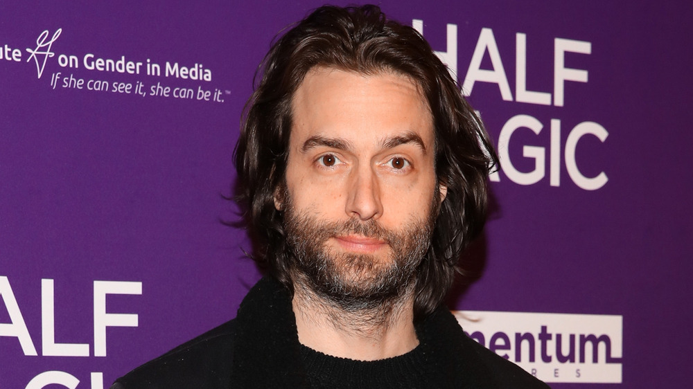 Chris D'Elia raising one eyebrow 