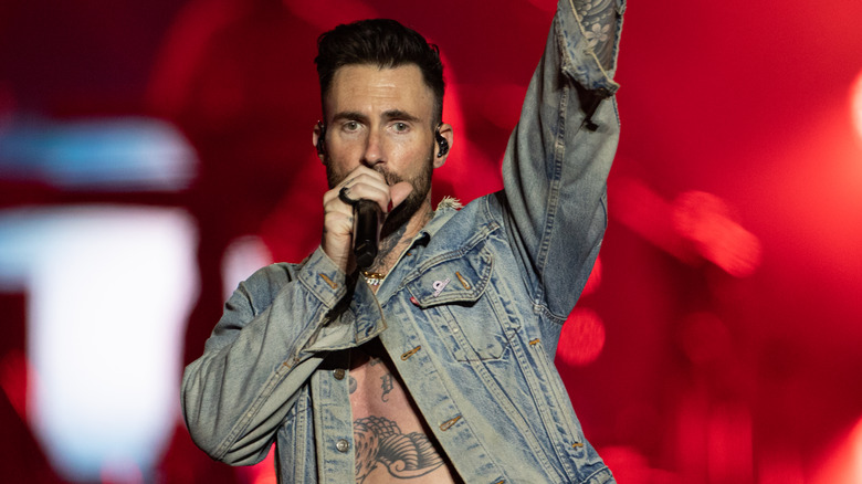 Adam Levine performing