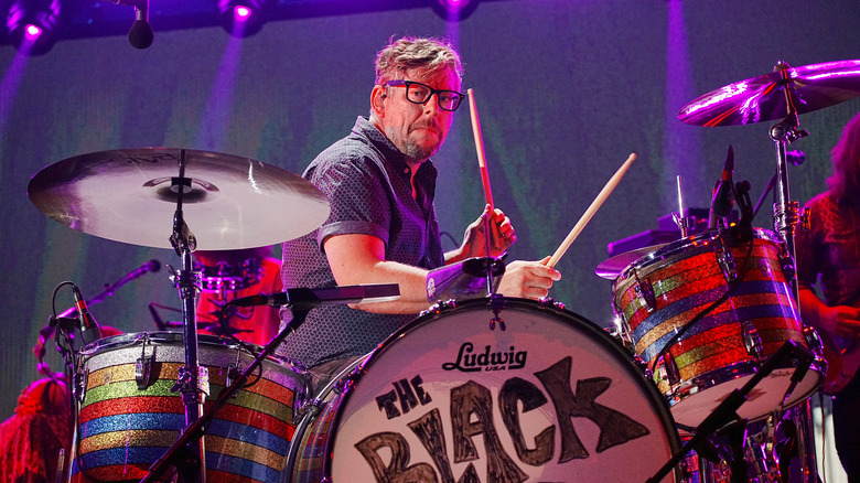 Patrick Carney drumming on stage