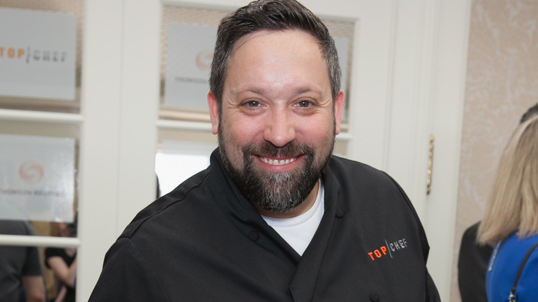 Mike Isabella smiling at event