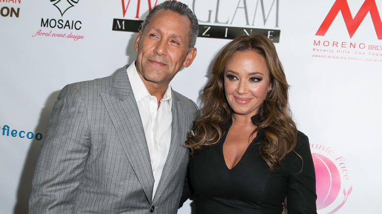 Angelo Pagan and Leah Remini smiling together