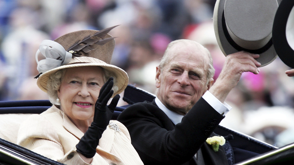 Queen Elizabeth & Prince Philip waving