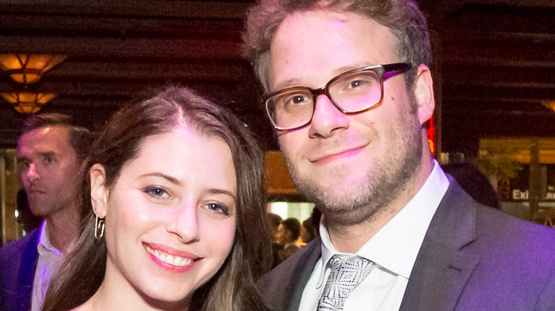 Seth Rogen and his wife Lauren Miller, both smiling