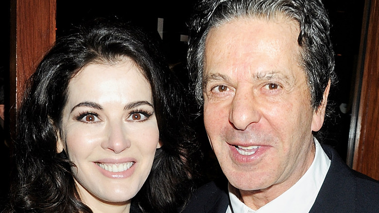 Nigella Lawson and Charles Saatchi, both smiling