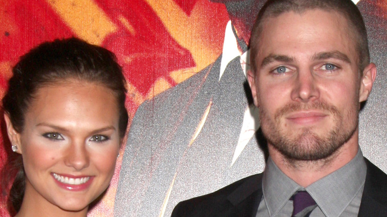 Stephen Amell and Cassandra Jean Amell smiling