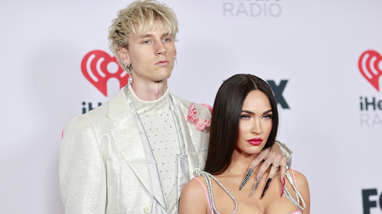 Megan Fox and Machine Gun Kelly posing