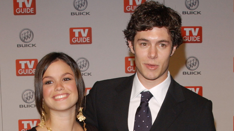 Rachel Bilson and Adam Brody smiling