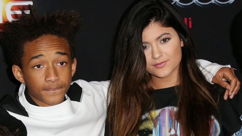 Jaden Smith with his arm around Kylie Jenner 