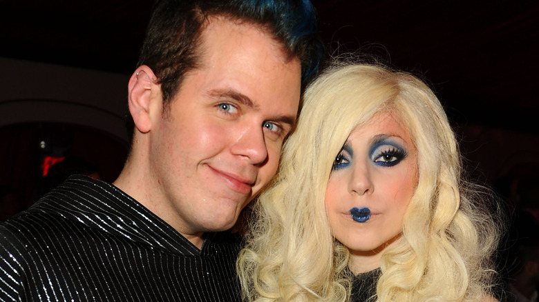 Perez Hilton and Lady Gaga posing together