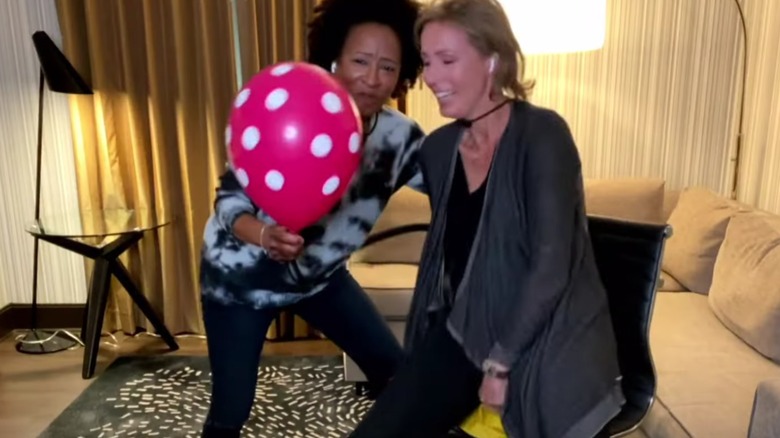 Wanda Sykes and wife with balloon