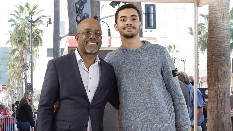 Darius Rucker with arm around Jack Rucker