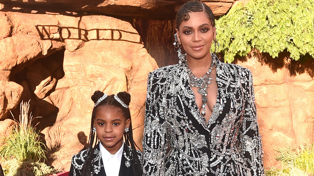 Blue Ivy Carter and Beyoncé on a red carpet