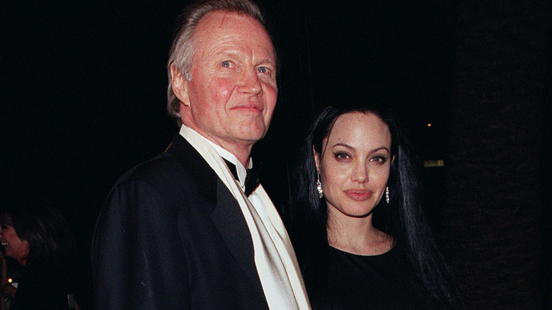 Angelina Jolie and Jon Voight smiling 