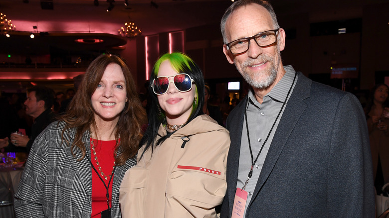 Billie Eilish and her parents smiling 