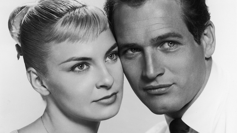 Paul Newman and Joanne Woodward posing 