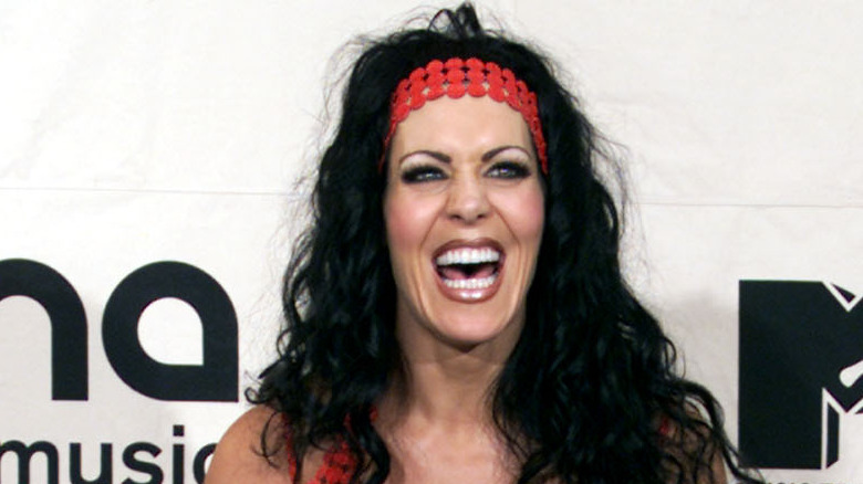 Joanie Lauer aka Chyna with mouth open and grinning