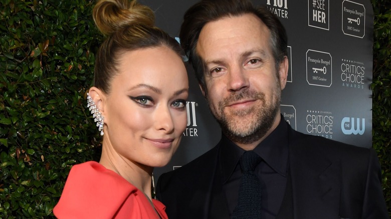 Olivia Wilde smiling with Jason Sudeikis