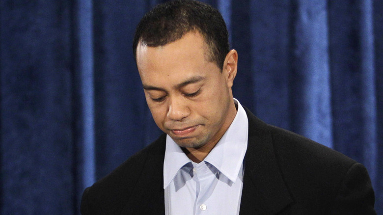 Tiger Woods apologizing for his affairs,