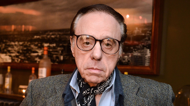 Peter Bogdanovich posing for the cameras