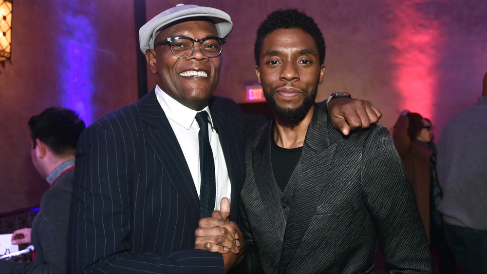 Samuel L. Jackson and Chadwick Boseman posing together