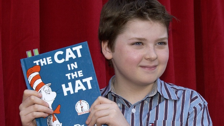 Spencer Breslin holding The Cat in the Hat