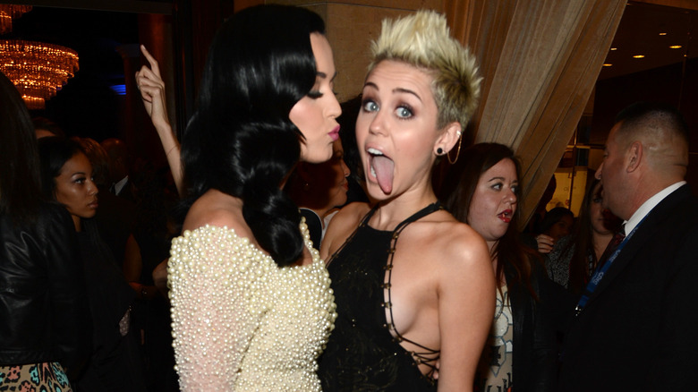 Katy Perry making kissy face at Miley Cyrus