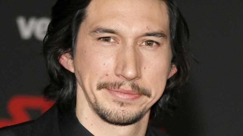 Adam Driver grinning