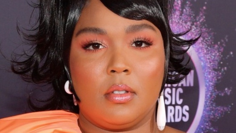 Lizzo looking at camera