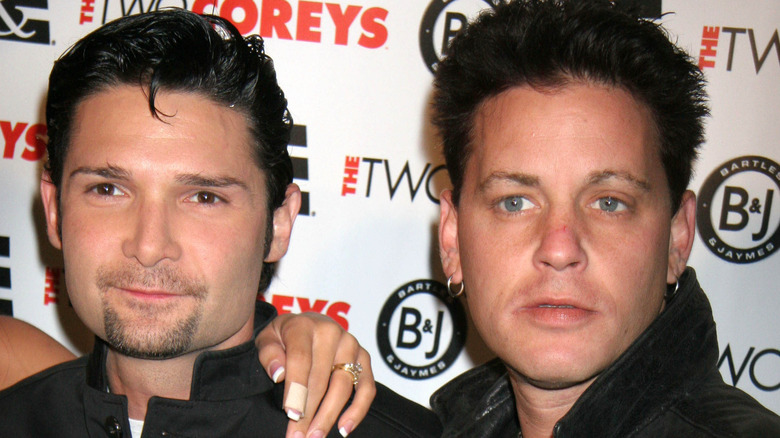 corey feldman posing red carpet with corey haim