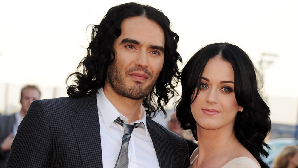 Russell Brand and Katy Perry posing at the European premiere of Arthur